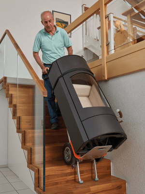 Elektrisk Trappklättrare CC200V+200 transporterar en braskamin i en trappa