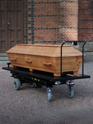 Elektrisk kistvagn, med kista