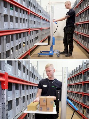 Lyftvagn ECO 70E, en elektrisk lätt lyftvagn körs bland hyllor